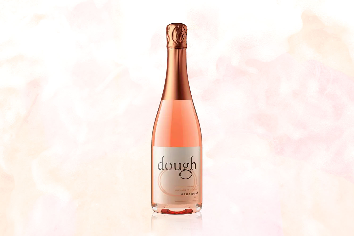 A bottle of Dough Sparkling Rosé on a pale pink background