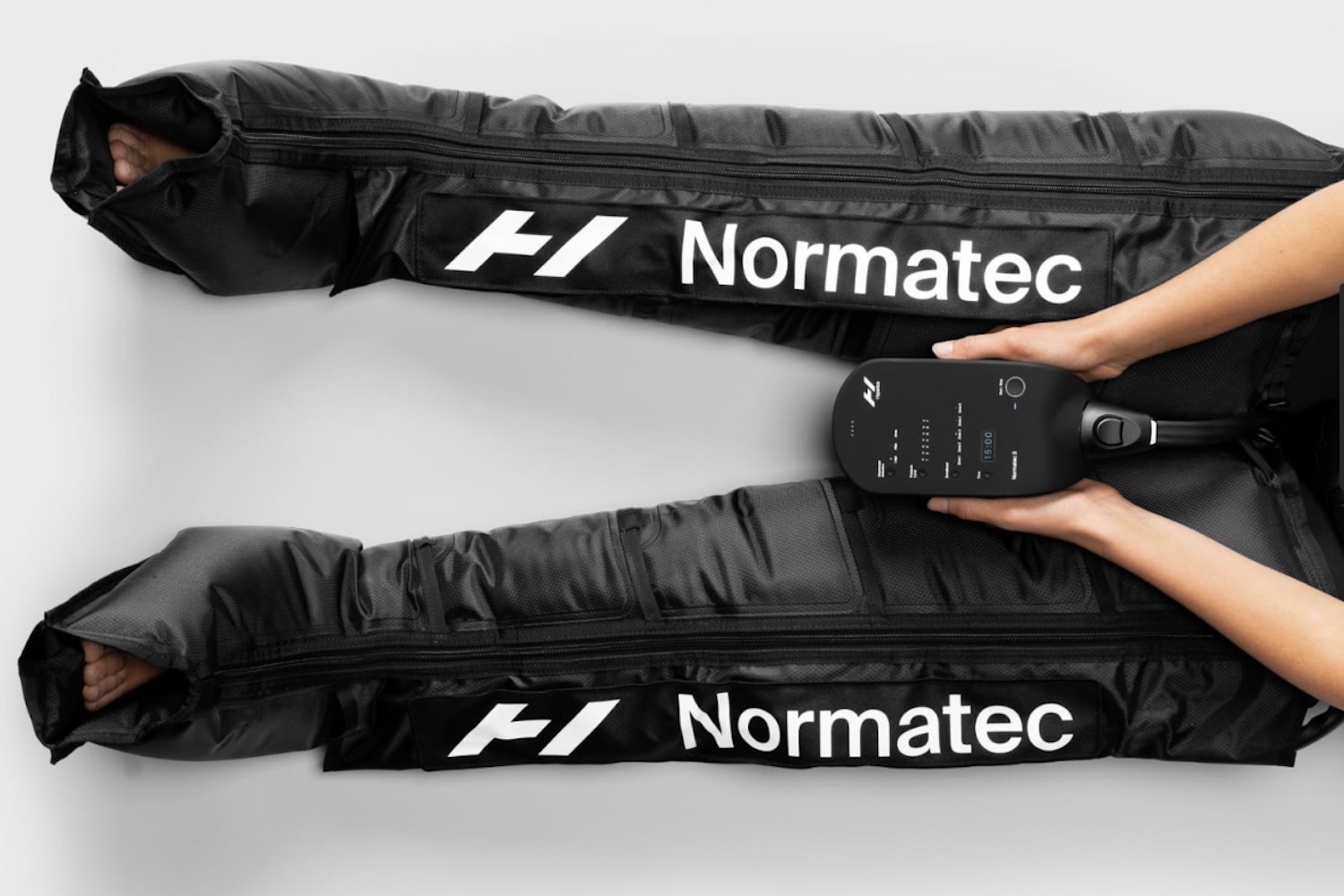 a model in normtec hyperice compression gear