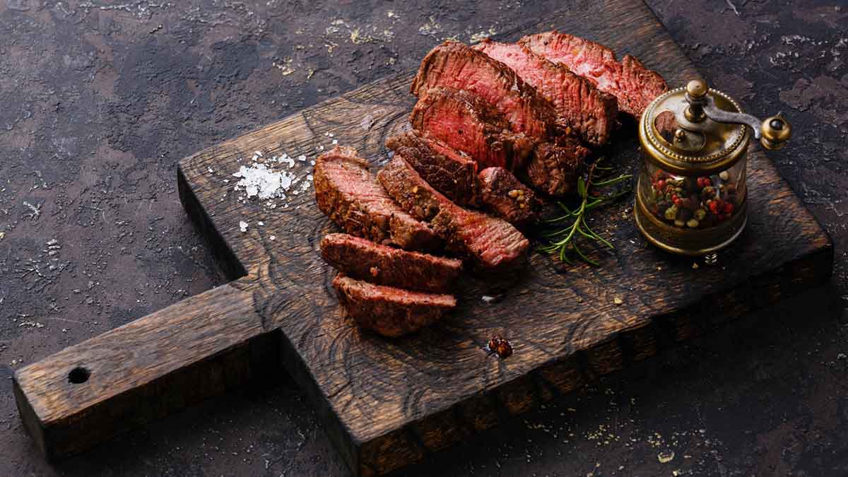 A sliced open steak from Crowd Cow on a serving platter