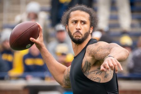 Colin Kaepernick participates in a throwing exhibition at Michigan Stadium in April.