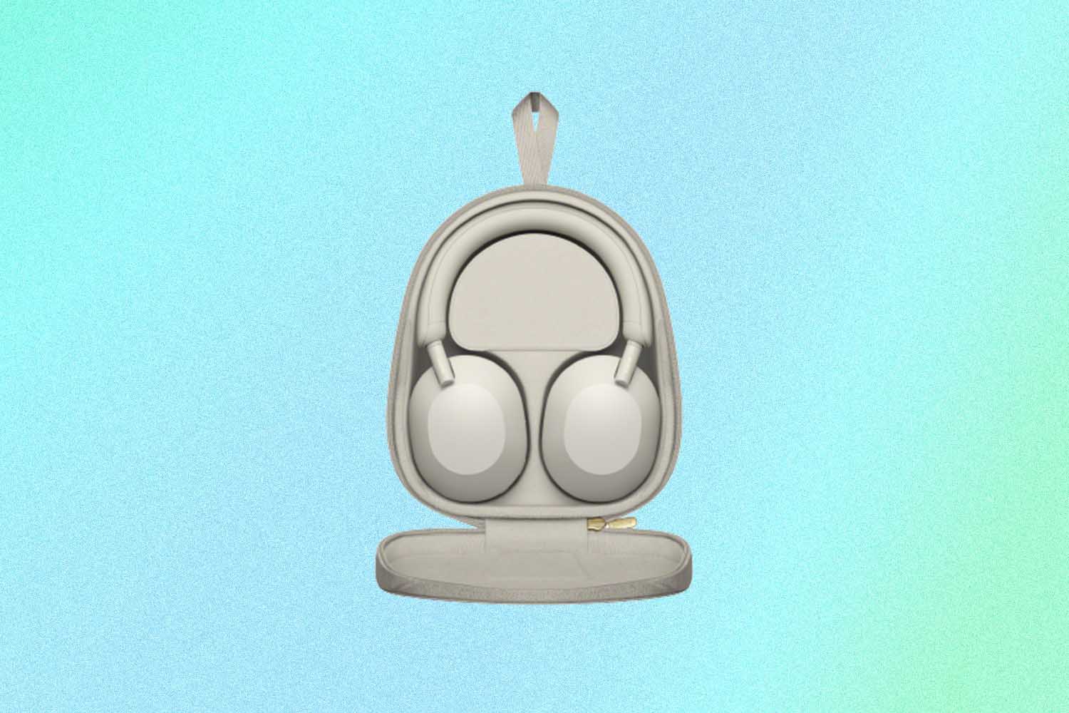 The white Sony WH-1000XM5 headphones in white and in packaging