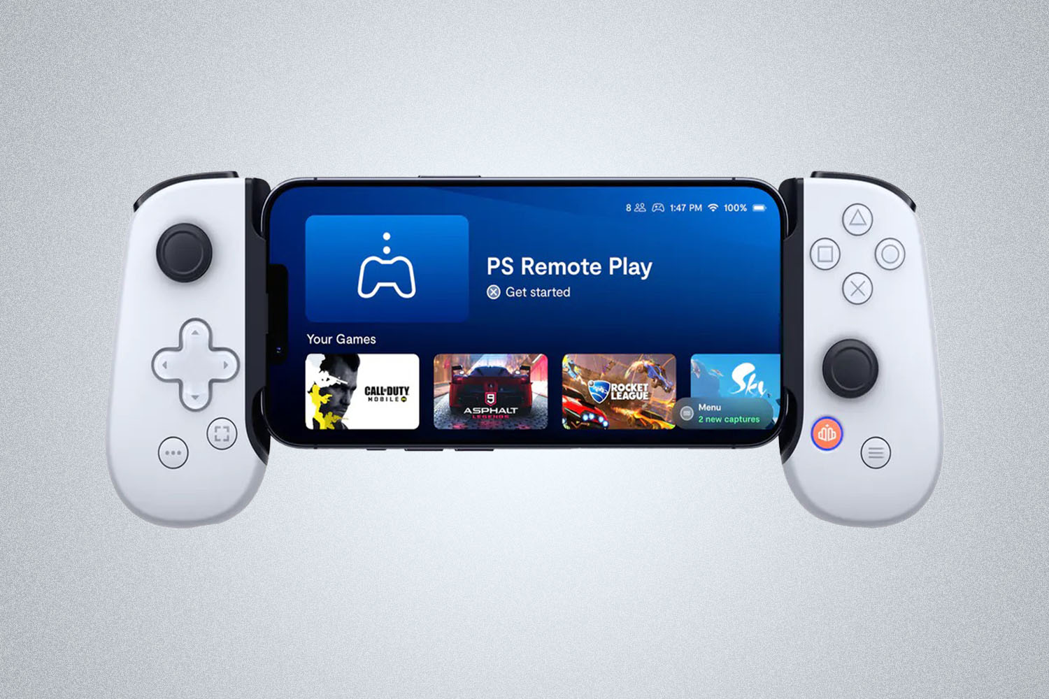 a mobile phone on the Backbone Labs Playstation Edition device on a grey background