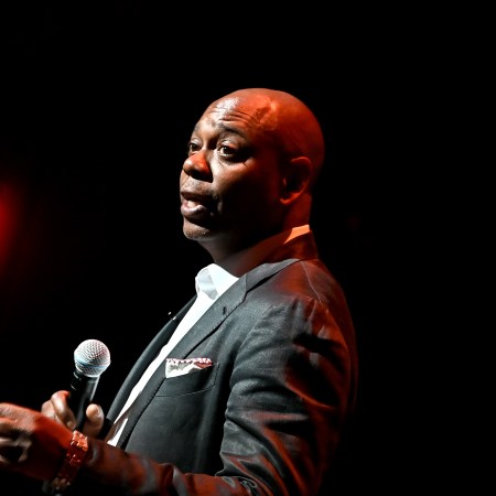 Dave Chappelle performs onstage during the Dave Chappelle theatre dedication ceremony at Duke Ellington School of the Arts on June 20, 2022 in Washington, DC.