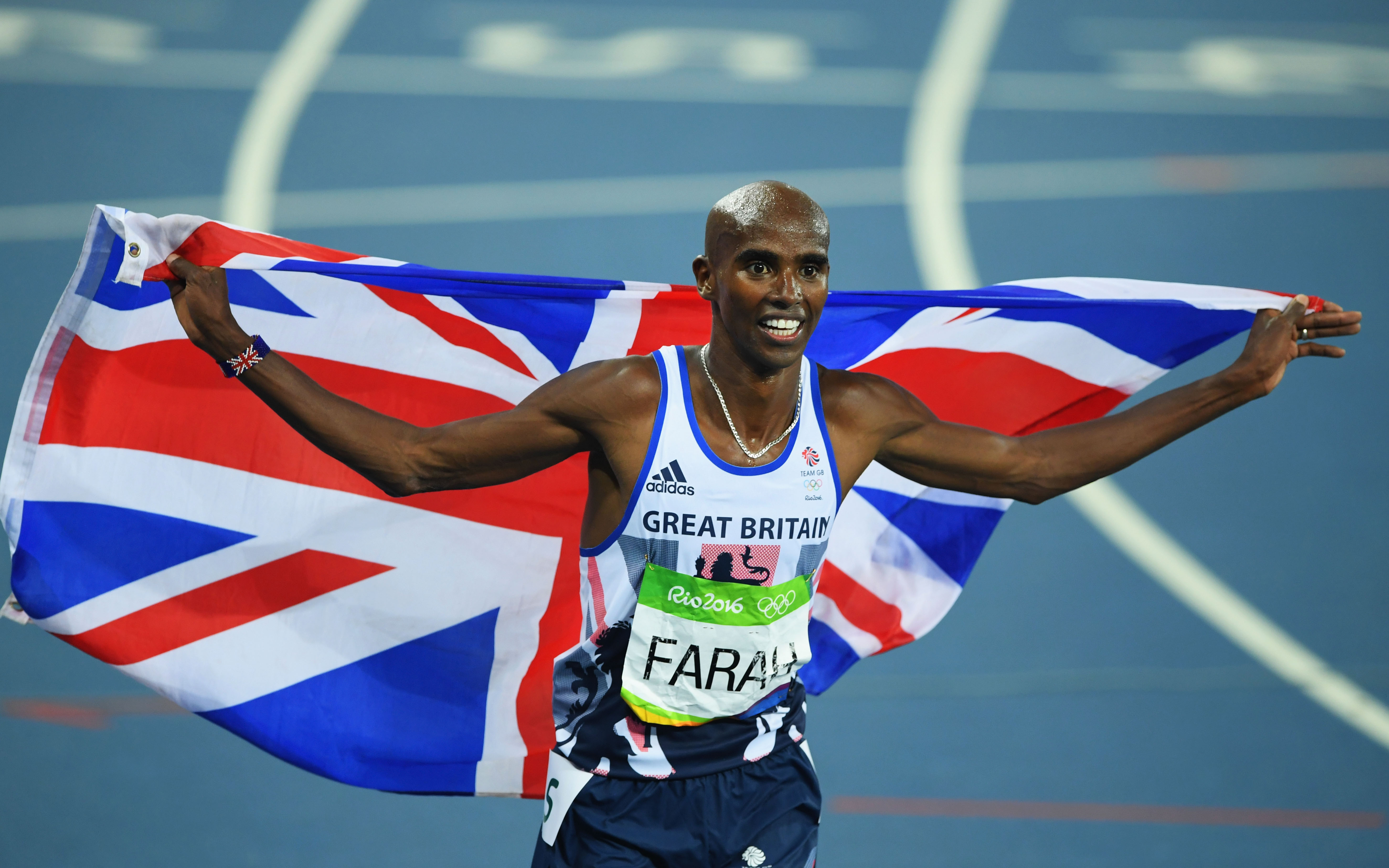 Sir Mo Farah celebrates after winning a gold medal in the Rio Olympics. He recently revealed that he was trafficked to the U.K. as a child.