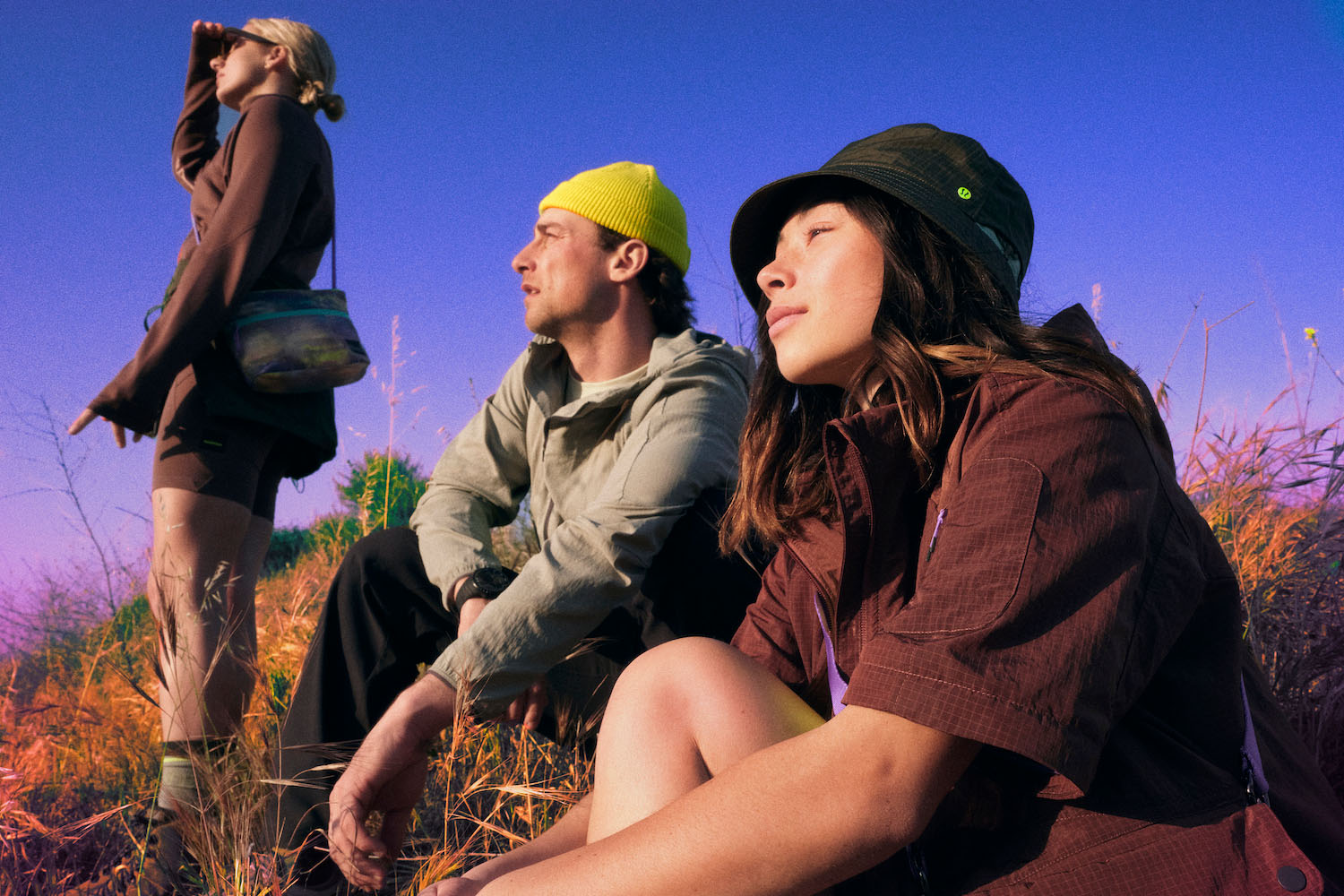 three models in lululemon hike clothing in the wilderness
