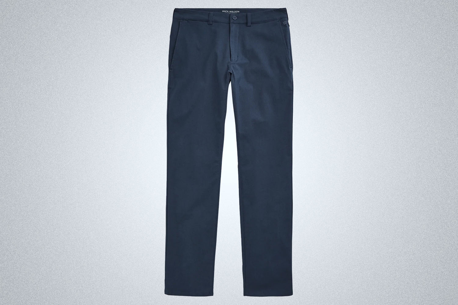 a pair of navy colored chinos from Mack Weldon on a grey background