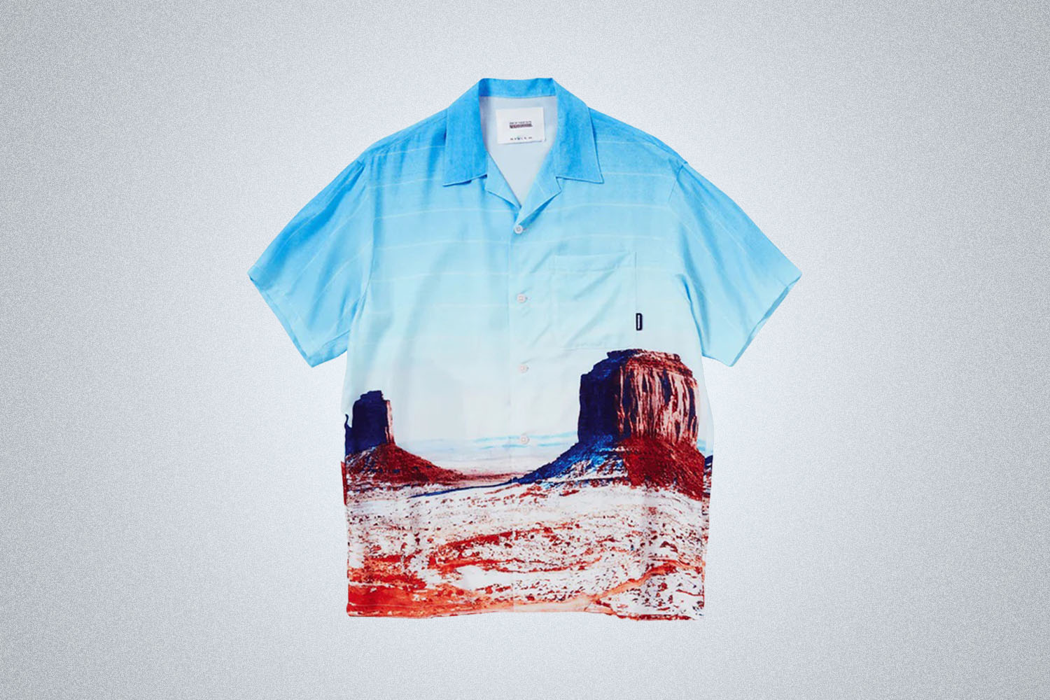 The One Of These Days short sleeve button up with a western print on a grey background