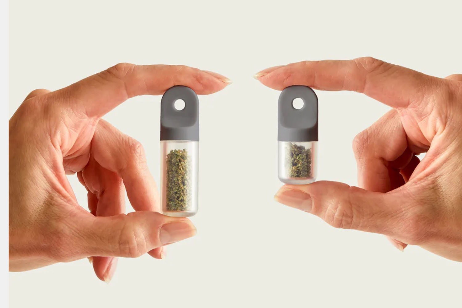 two hands holding the Session stash pods