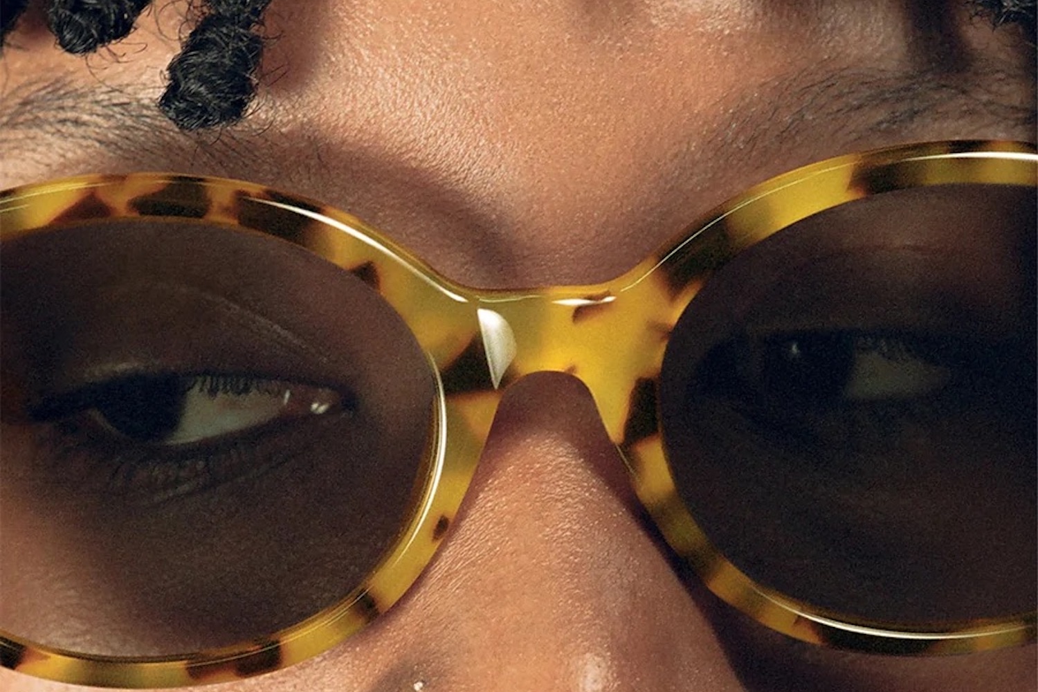 a model in Stussy 22' Eyewear