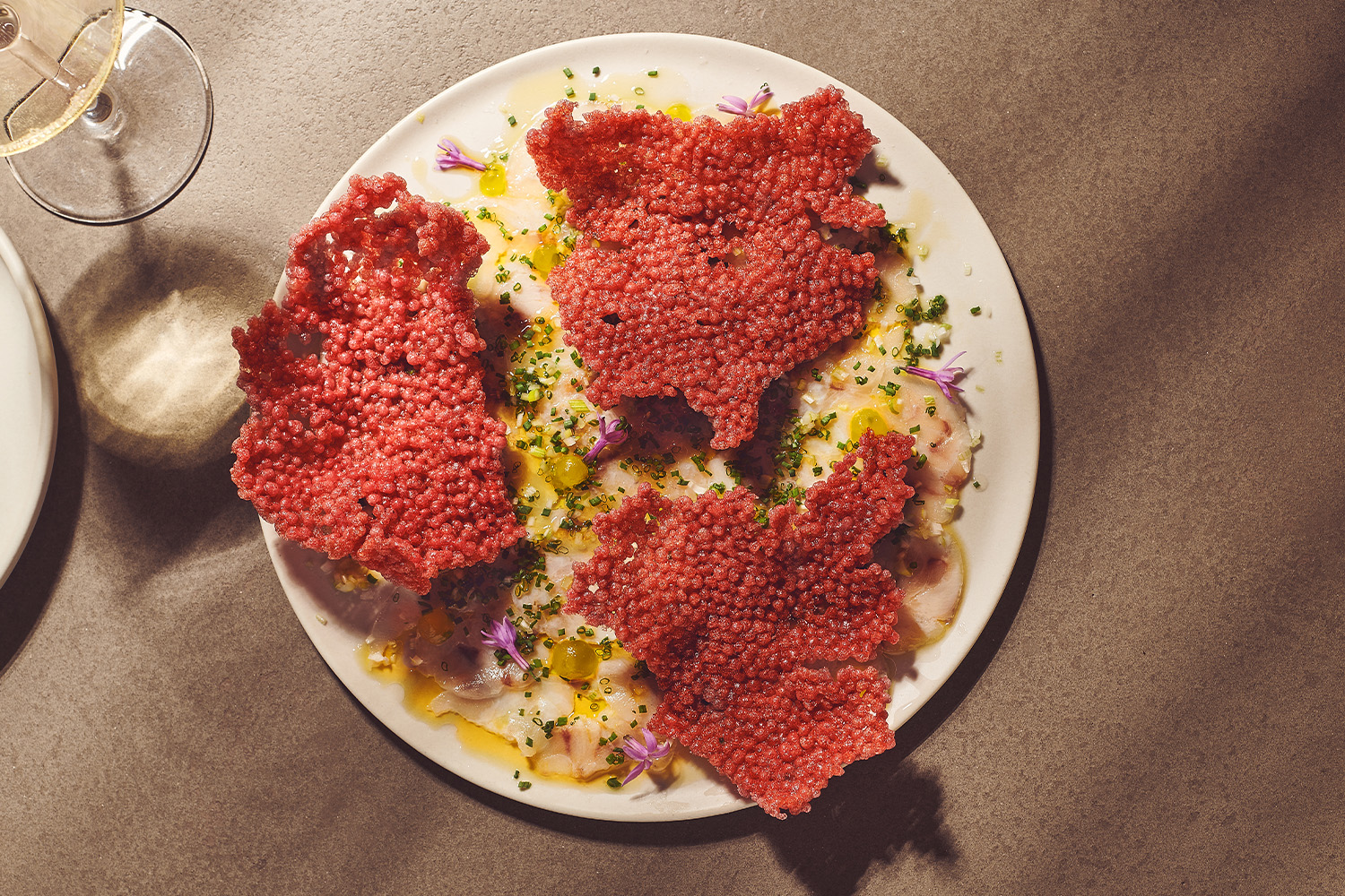 Garlic blossoms with beetroot chips