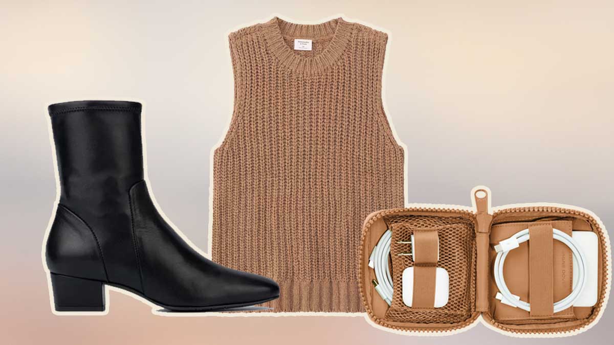 A black boot, brown sweater tank and brown tech organizer