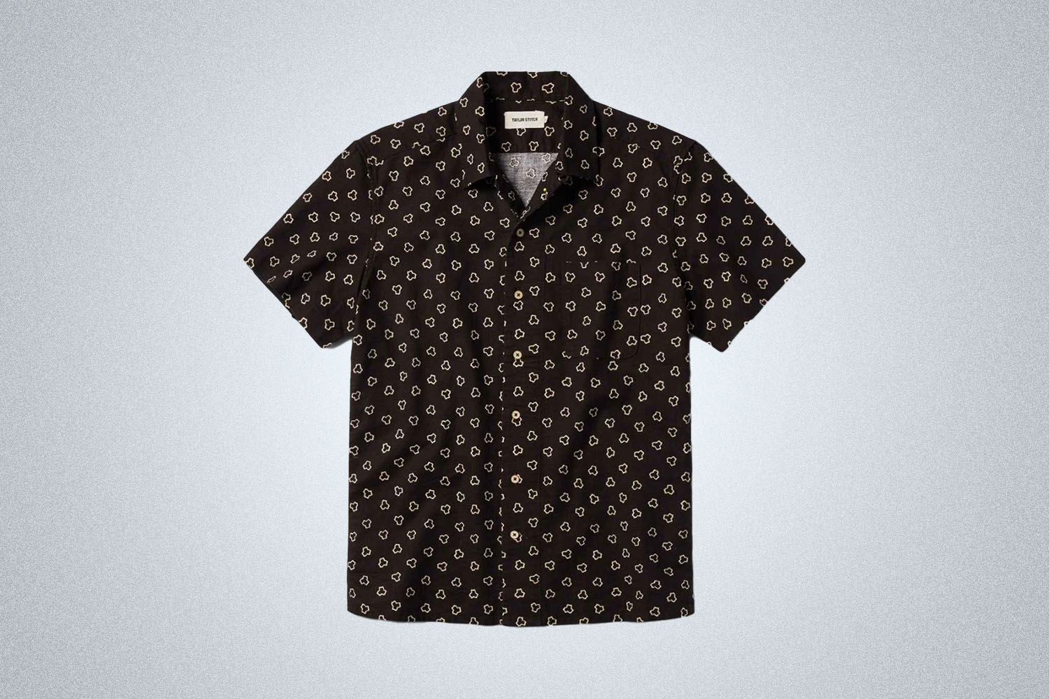 a brown and white patterned shirt from Taylor Stitch on a grey background