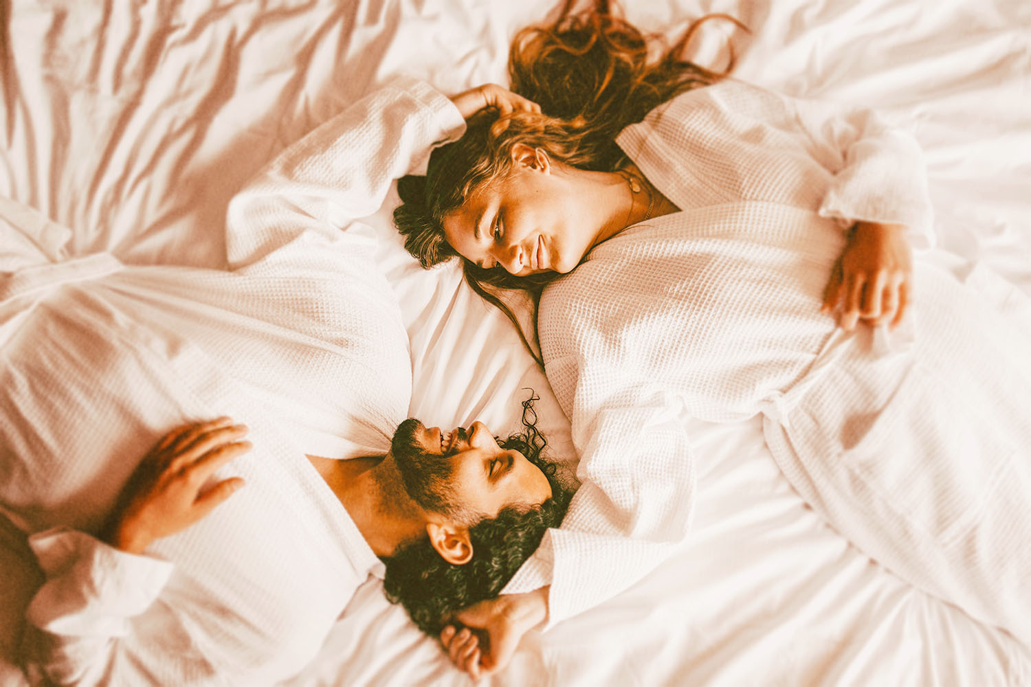 couple lying in bed