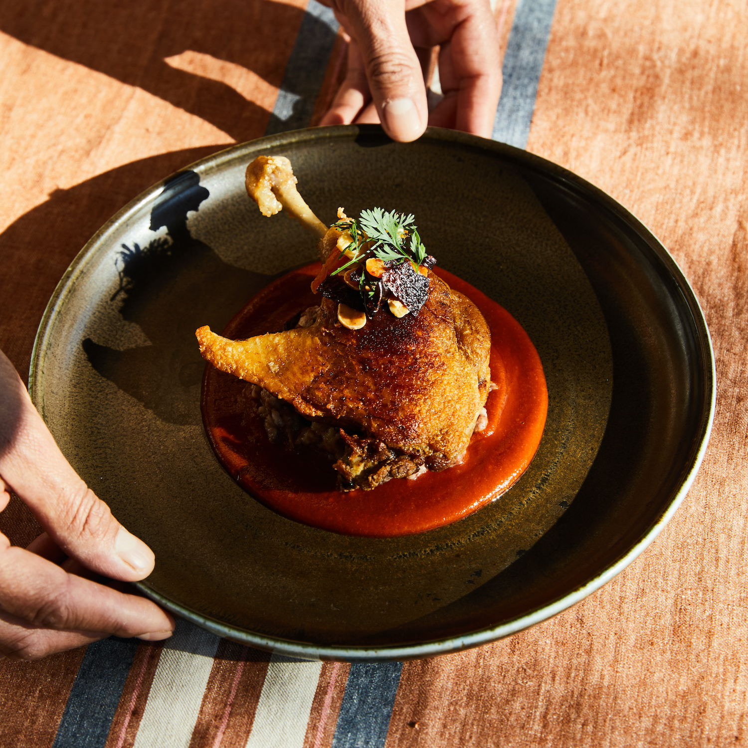 The confit Liberty Duck leg with apricot mole from El Alto, the Traci Des Jardins and Robert Hurtado restaurant in Los Altos