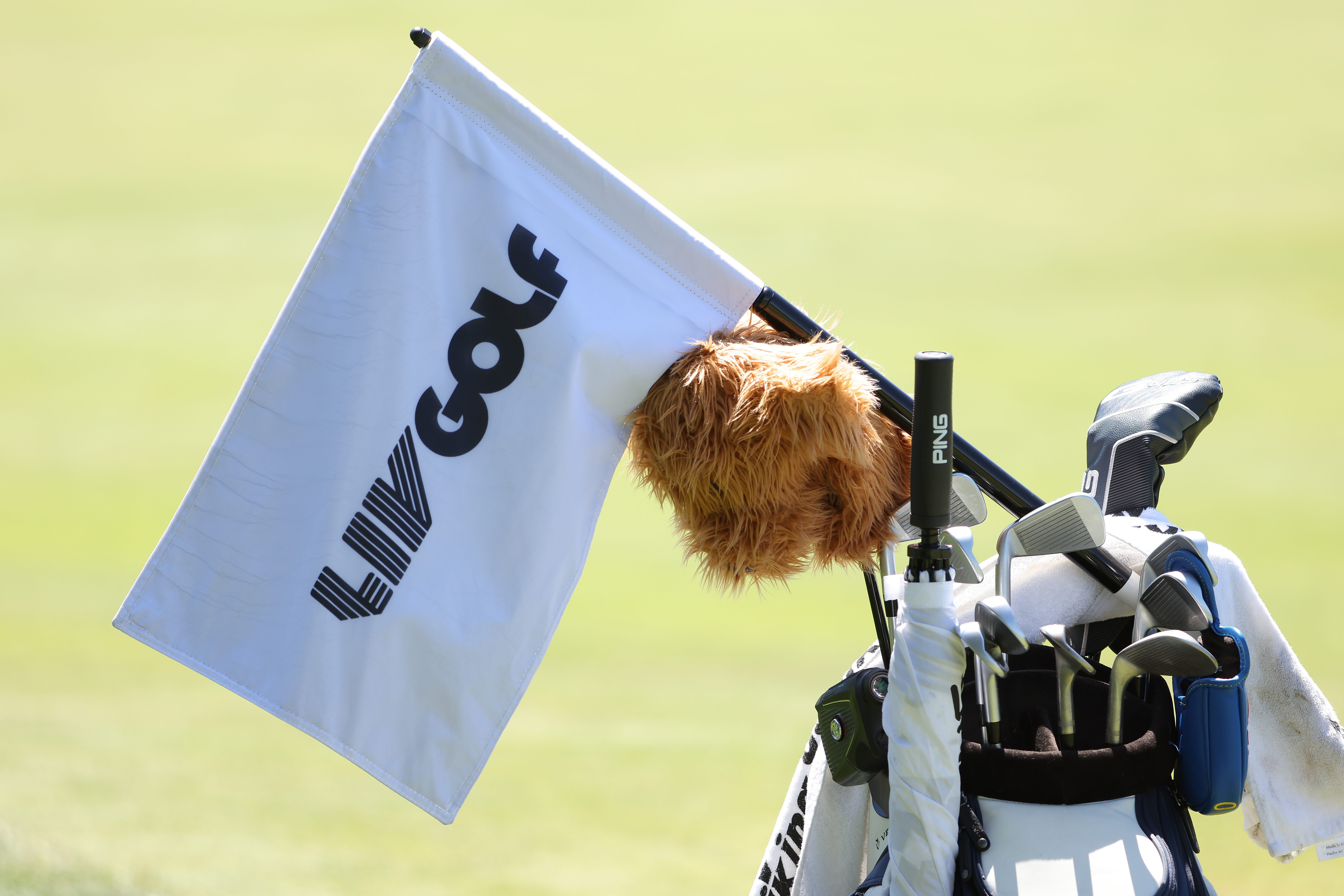 A flag with the LIV Golf logo in Portland at Pumpkin Ridge Golf Club.