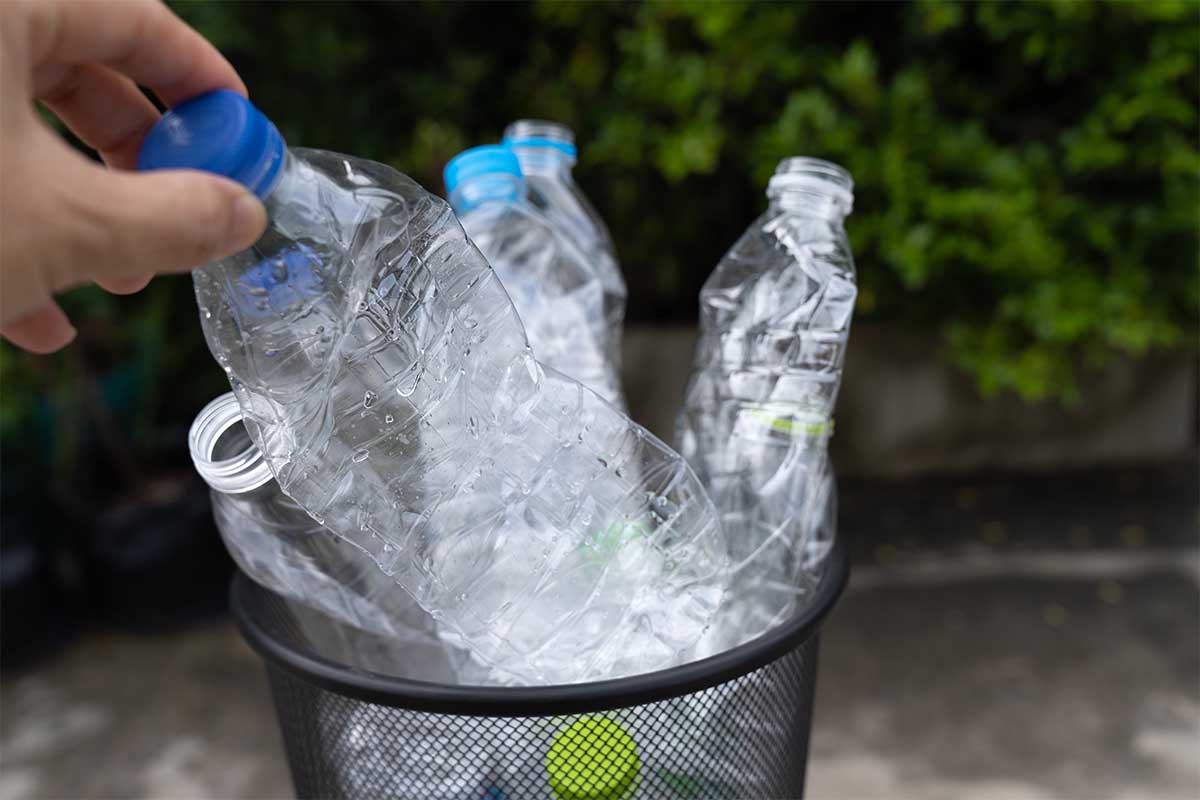 A recycling can full of plastic water bottles — a new study suggests most plastic water bottles in France are full of microplastics, which might have a detrimental effect on the environment and your health