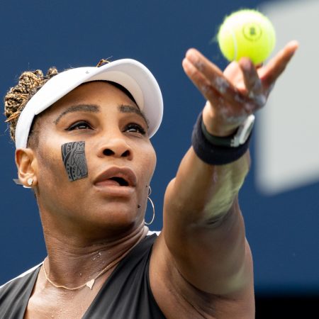 Serena Williams serves a ball at the National Bank Open tennis tournament.