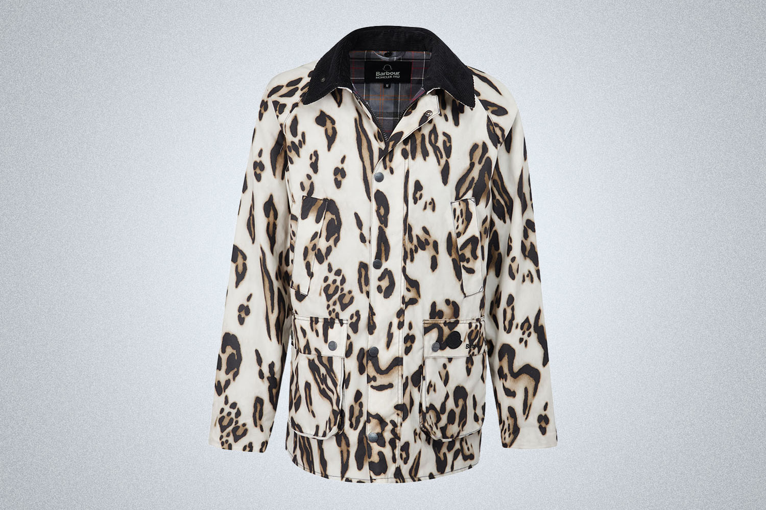 a speckled Barbour x Moncler jacket on a grey background