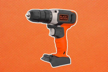 A drill from Black & Decker being used on a table. Tools from B&D are currently on sale at Woot.