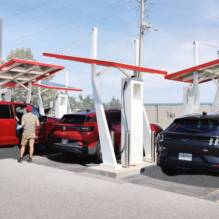 A Ford F-150 Lightning, Volkswagen ID.4 and Ford Mustang Mach-E charging at the Electrify Canada station in Kingston, Ontario