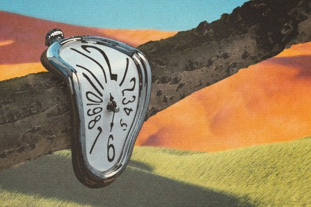 Dali melting clock on a log with desert background