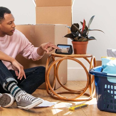Man on floor asking an Amazon Echo device a question. Is this really just Amazon Alexa ads?