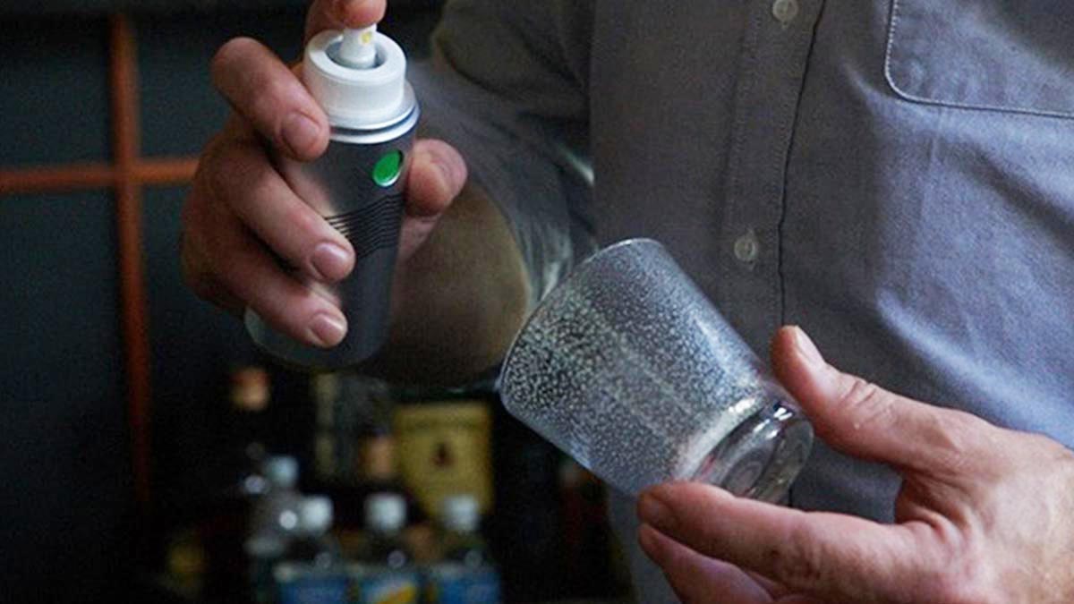 A person spraying from a Morgenthaler Triomphe Atomizer, a cool home bar tool from Cocktail Kingdom