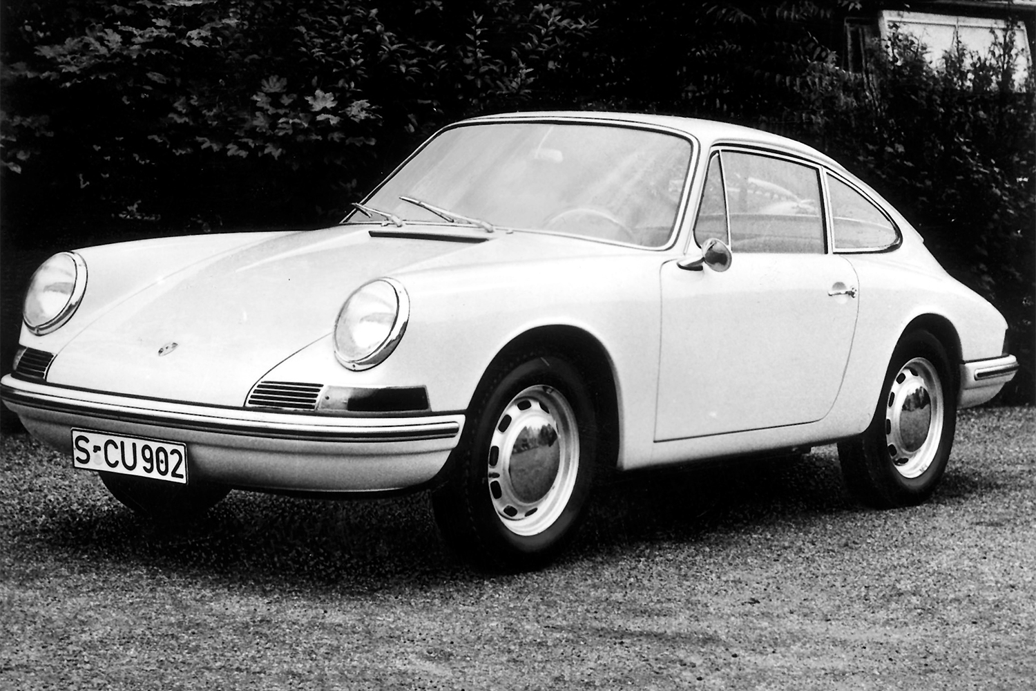 A black and white photo of the 1963 Porsche 901, the prototype of the Porsche 911