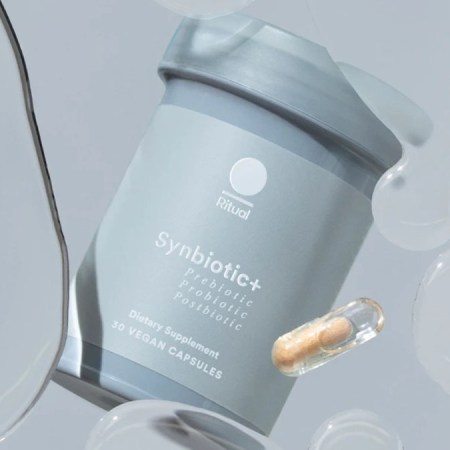 A bottle of Ritual's new probiotic supplement Synbiotic+, as well as what the daily pills look like