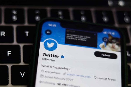 Twitter account of Twitter displayed on a phone screen and a laptop keyboard are seen in this illustration photo taken in Krakow, Poland on August 10, 2022. Twitter is testing an edit function, which is creating some controversey.