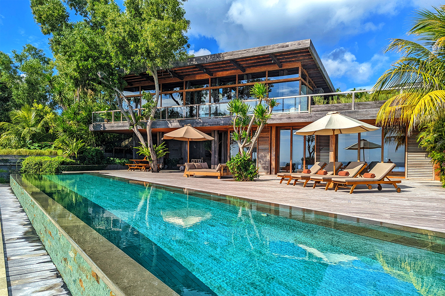 Lodging and a pool at Uluwatu Surf Villas in Bali, Indonesia