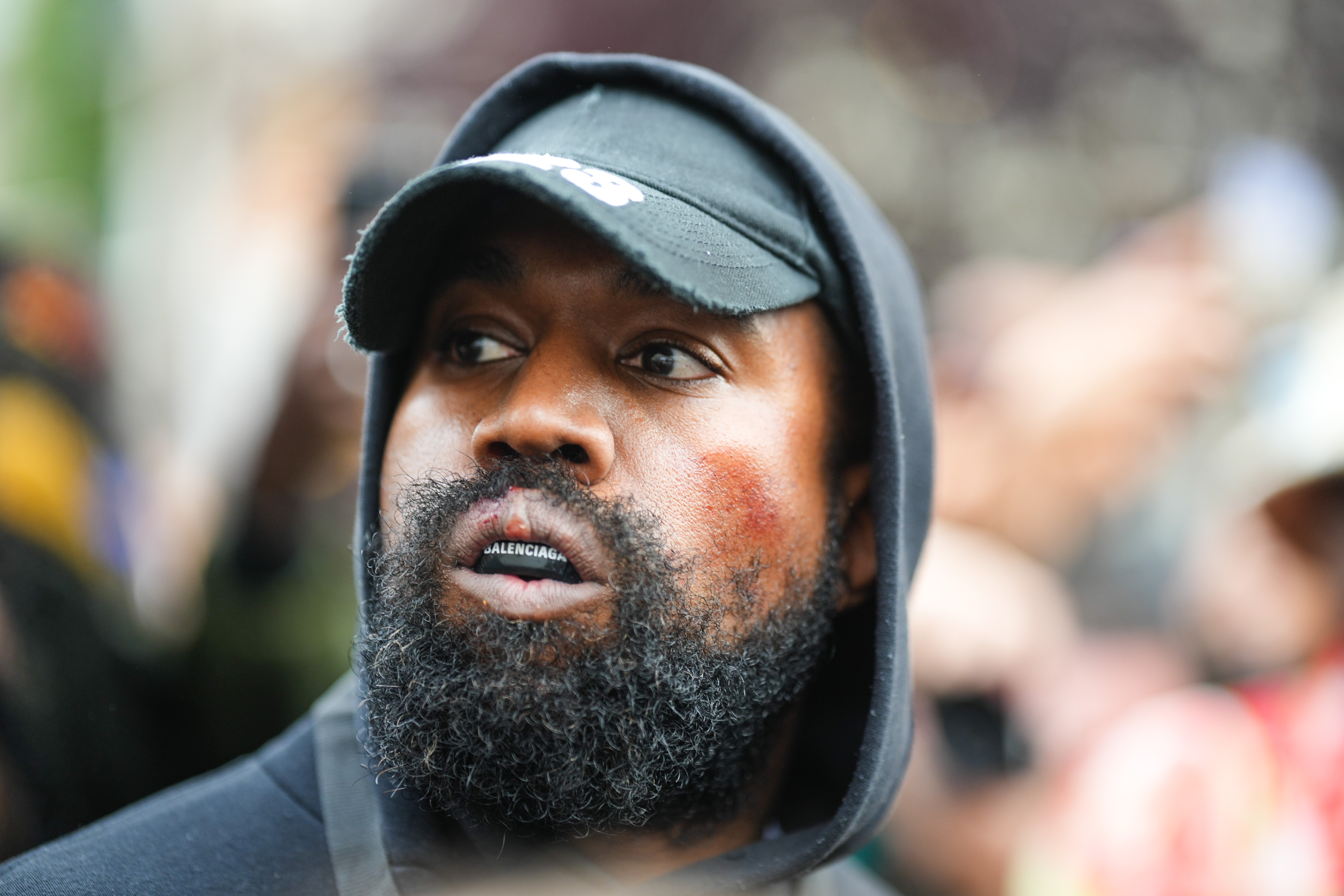 Kanye West aka Ye is seen wearing a Balenciaga boxing mouthguard on Oct. 2, 2022 in Paris, France.