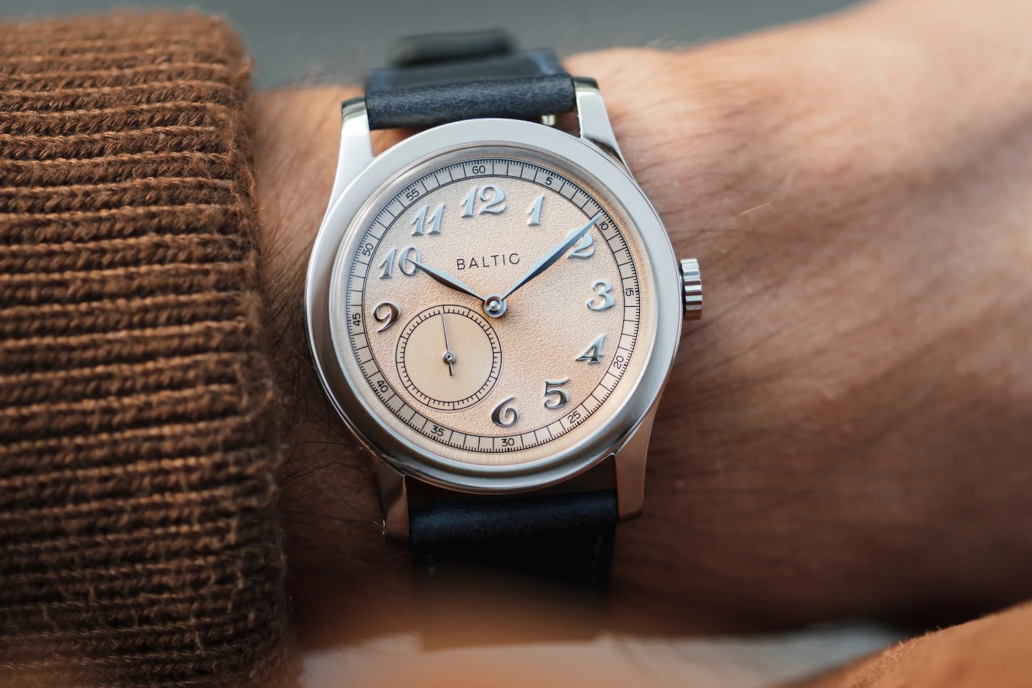a man wearing a Baltic dress watch
