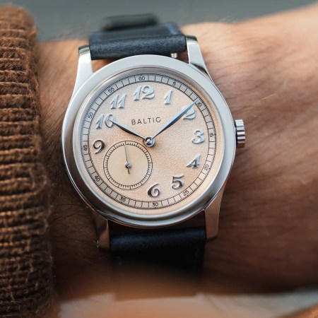 a man wearing a Baltic dress watch