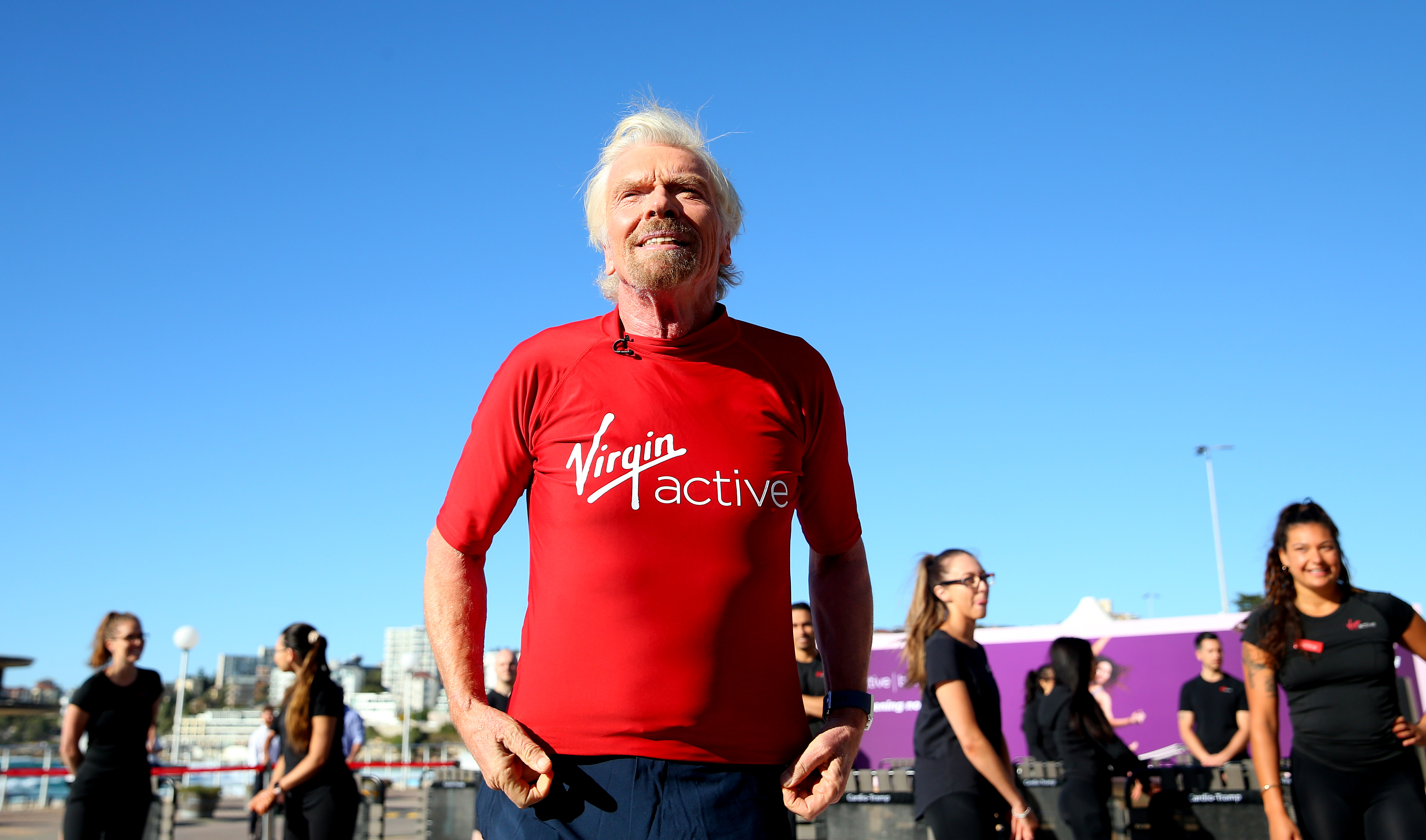 Richard Branson, the 72-year-old mogul, in a red Virgin Active shirt. He recently posted a workout video promoting the health clubs.