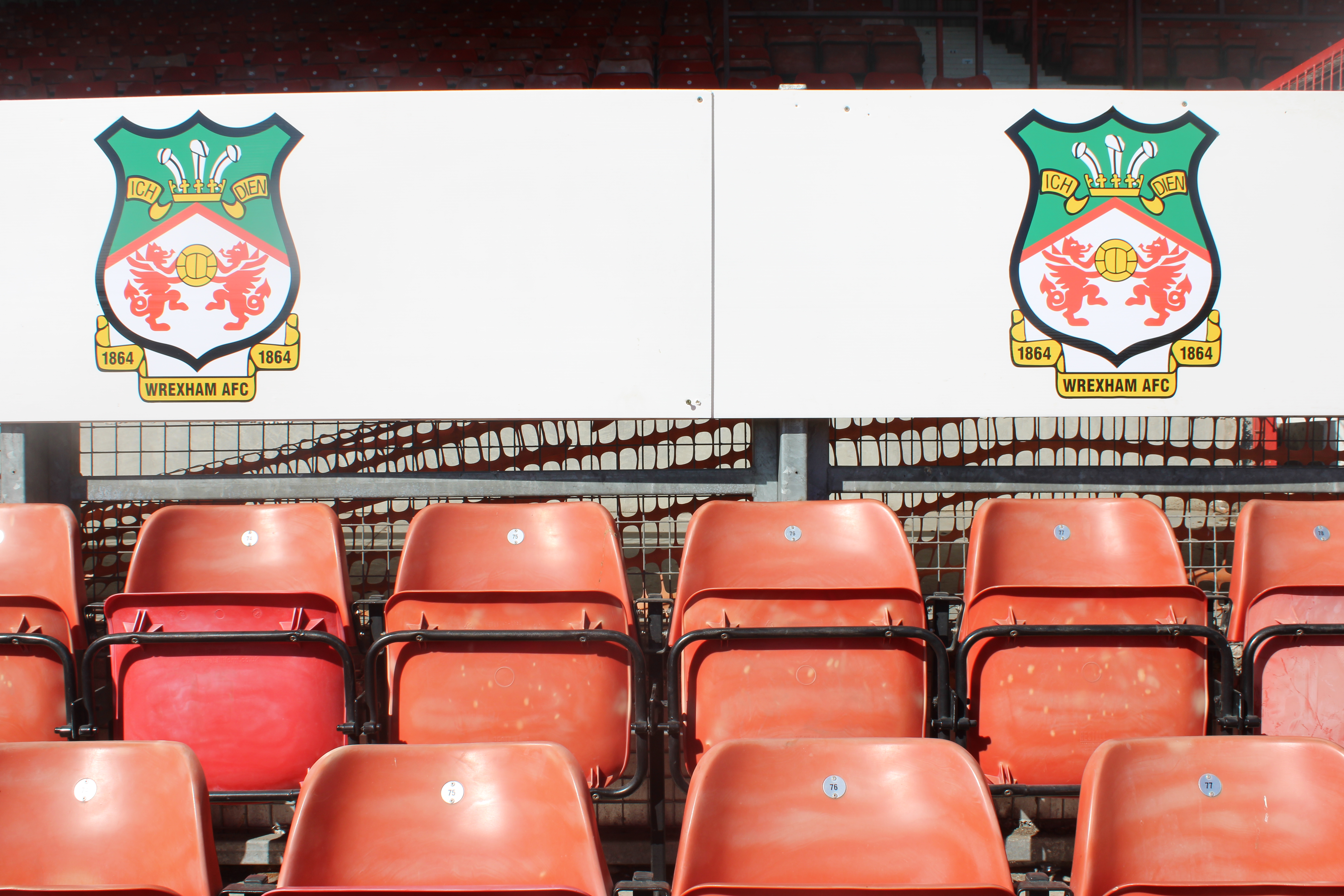 Empty seats in the stadium in Wrexham, Wales