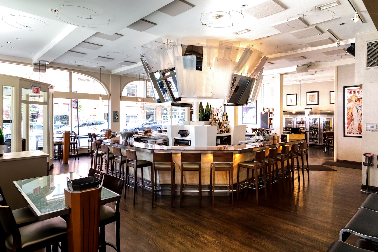 A quiet moment at the bar before service at Pops for Champagne in Chicago, which is celebrating 40 years in business
