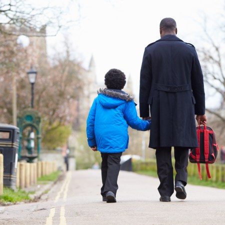 A father walking his son to school. A new study looks at "dad brain," or how the brain changes during early fatherhood.
