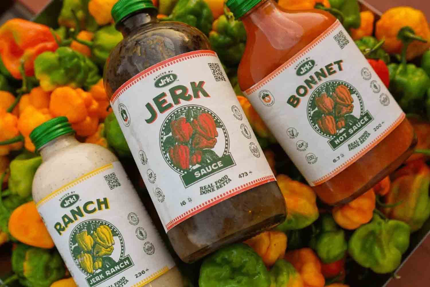 a collection of sauces on a veggie background