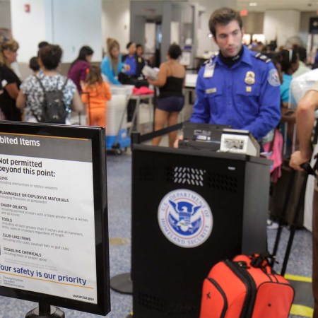 A prohibited items sign at the TSA security checkpoint in Miami International Airport.