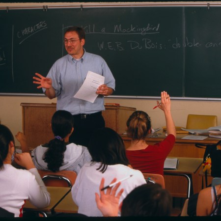 An English teacher in a classroom.