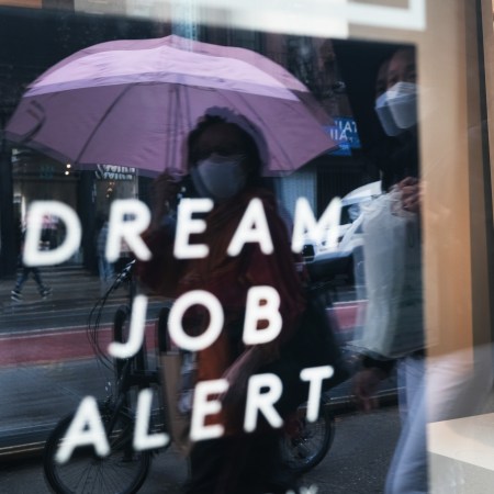 A creative "help wanted" sign on a window in New York.
