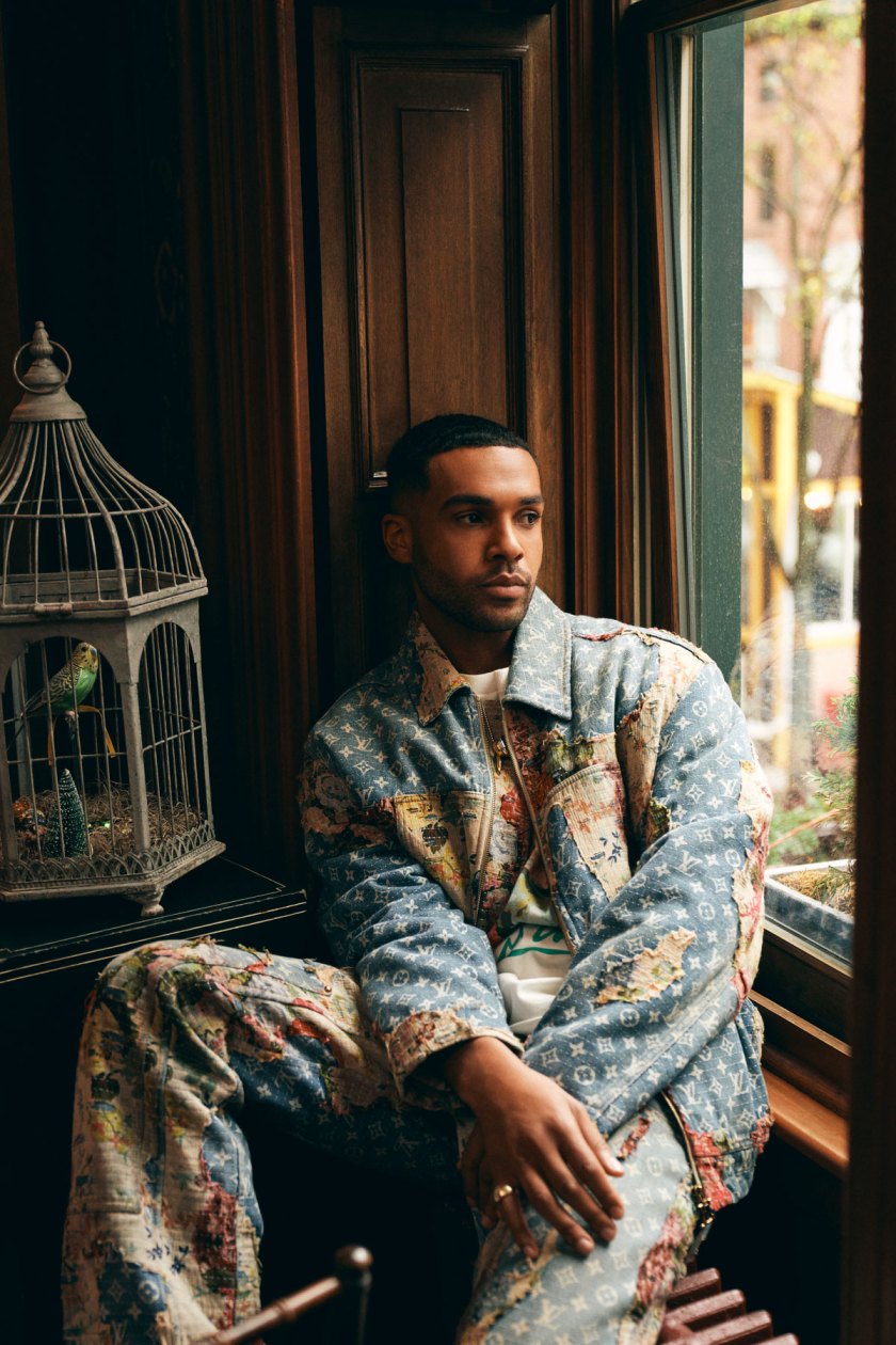 Lucien Laviscount wearing Louis Vuitton