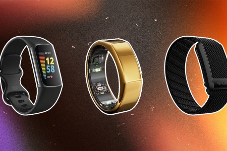 Fitness wearables on a pink, pruple and orange textured background