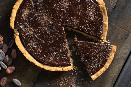 boozy desserts chocolate whiskey pie on a wooden table