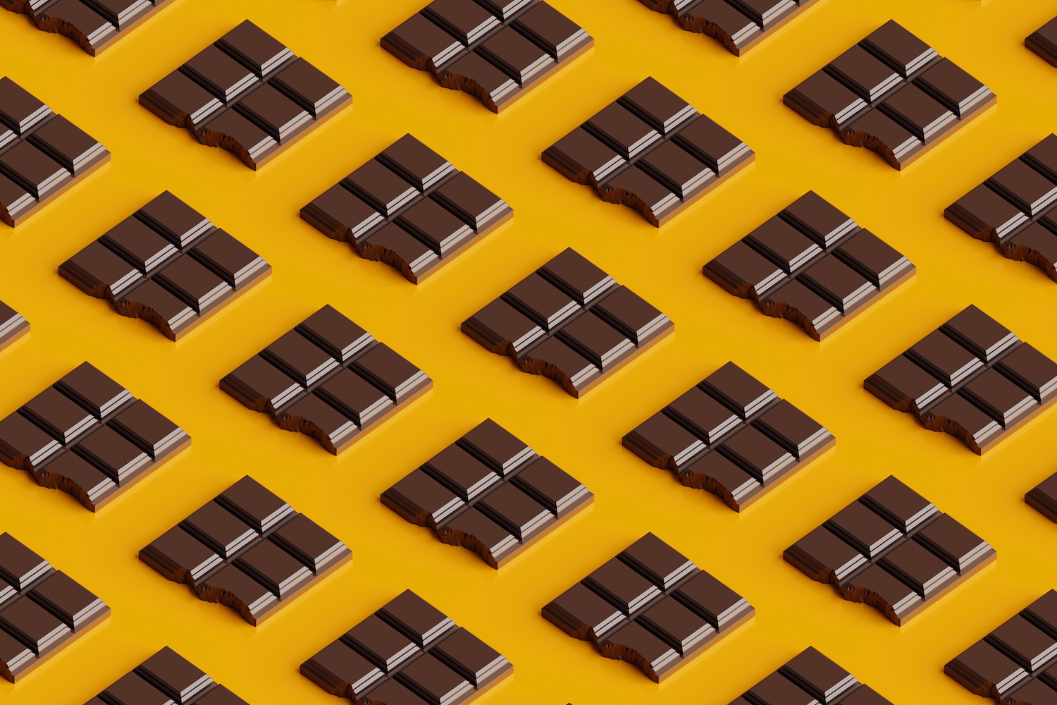 Seamless pattern of bitten chocolate bars on a yellow background
