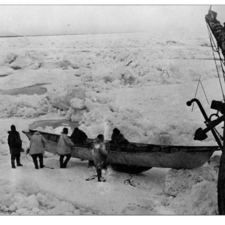 Taking a skin boat or "umiak" aboard the H.M.C.S. KARLUK
