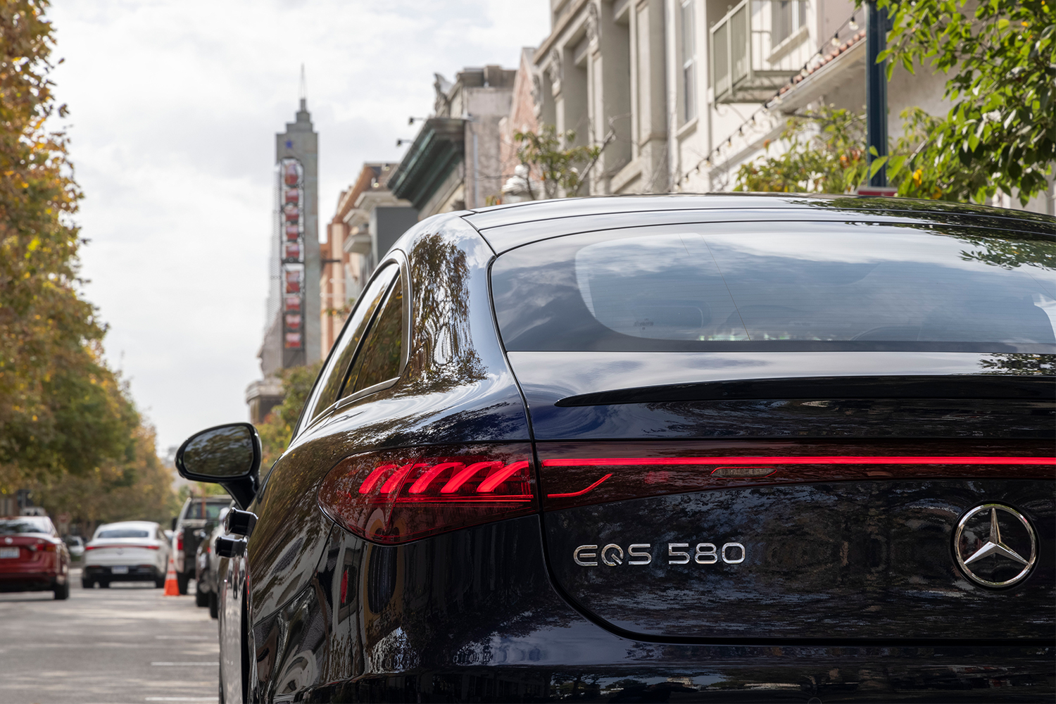The rear end of a Mercedes-Benz EQS, which features exit warnings for oncoming cars and bicycles