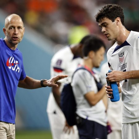United States coach Gregg Berhalter with Giovanni Reyna in Qatar.