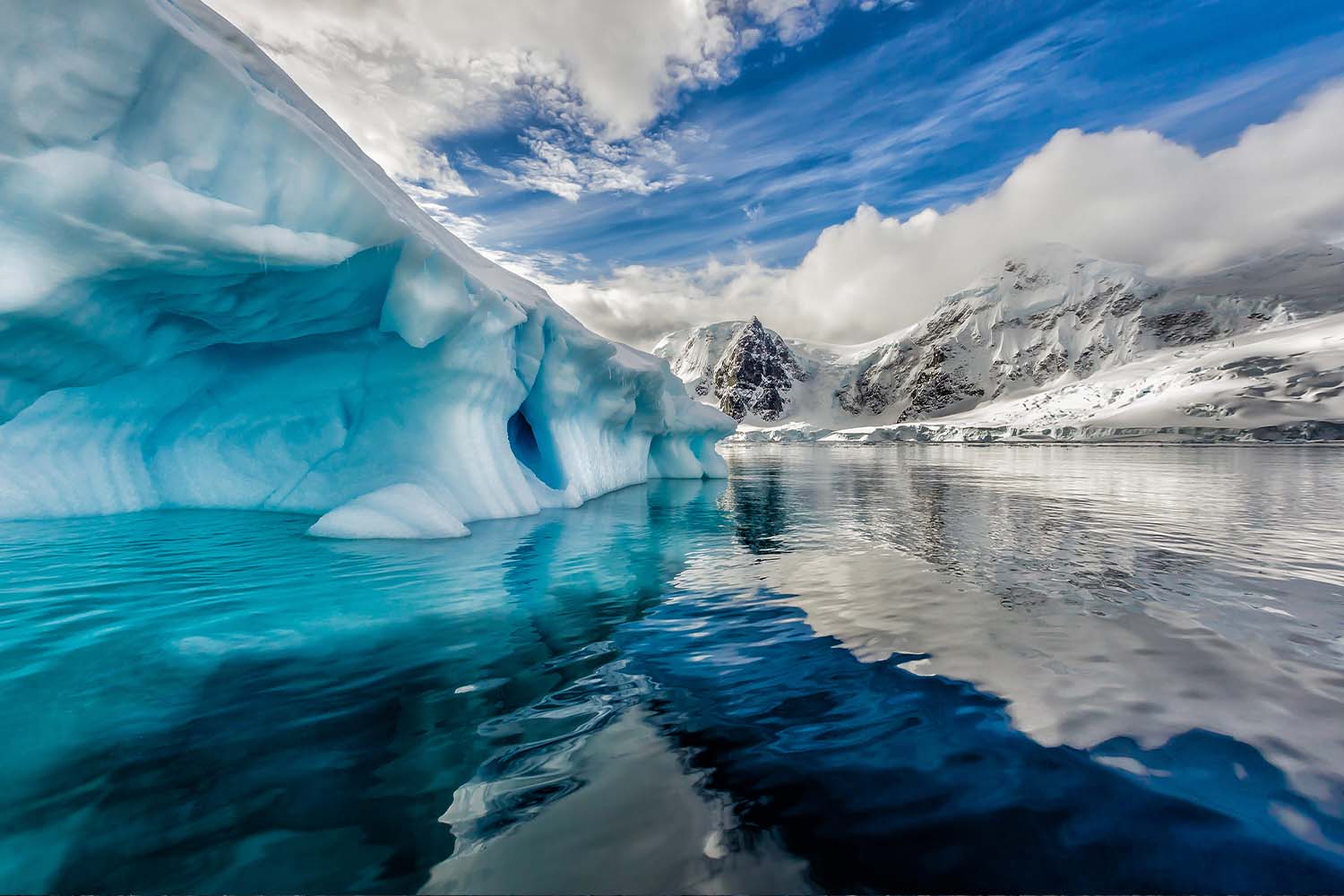 Iceberg floats in Andord Bay on Graham Land, Antarctica